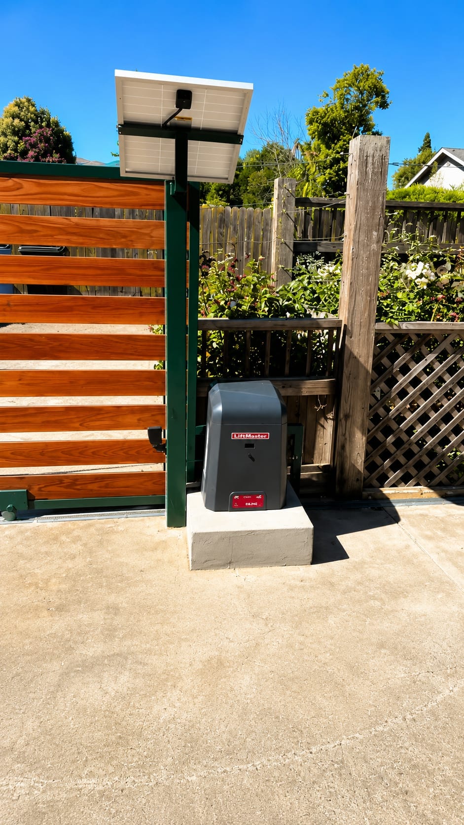 Redwood sliding driveway gate with slide-gate operator